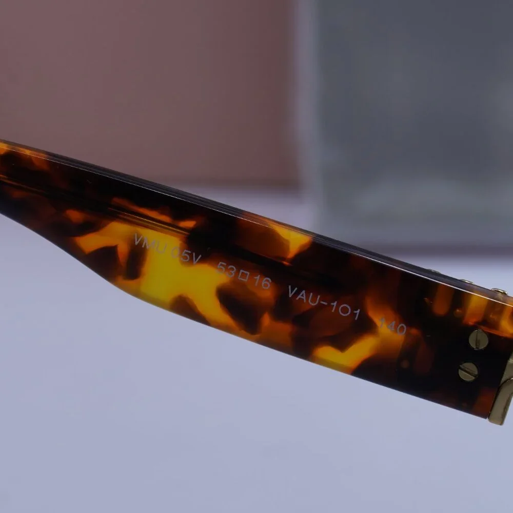 Miu Miu MU05VV VAU1O1 Cat Eye Eyeglasses 53mm – Honey Havana